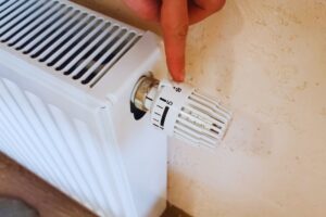 dito indica termostato del calorifero